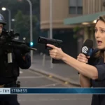 police officer shoots journalist