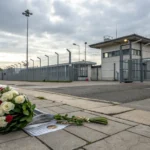 detainee shot dallas ice facility